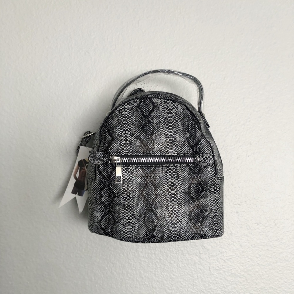 🆕 NWT Black and white snake print mini backpack